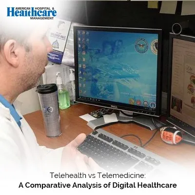 a man sitting at a desk looking at a computer screen