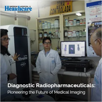 Four medical professionals in a lab analyze diagnostic images on a computer screen, with the text "Diagnostic Radiopharmaceuticals: Pioneering the Future of Medical Imaging" displayed at the bottom.